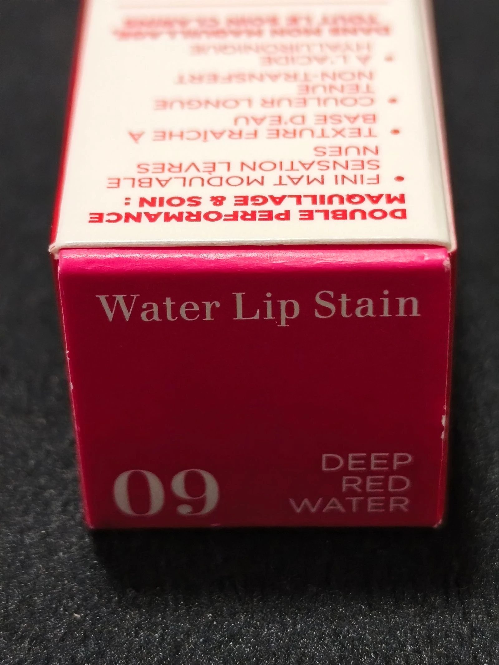 Neceser com batom da Clarins e cremes. – photo 10